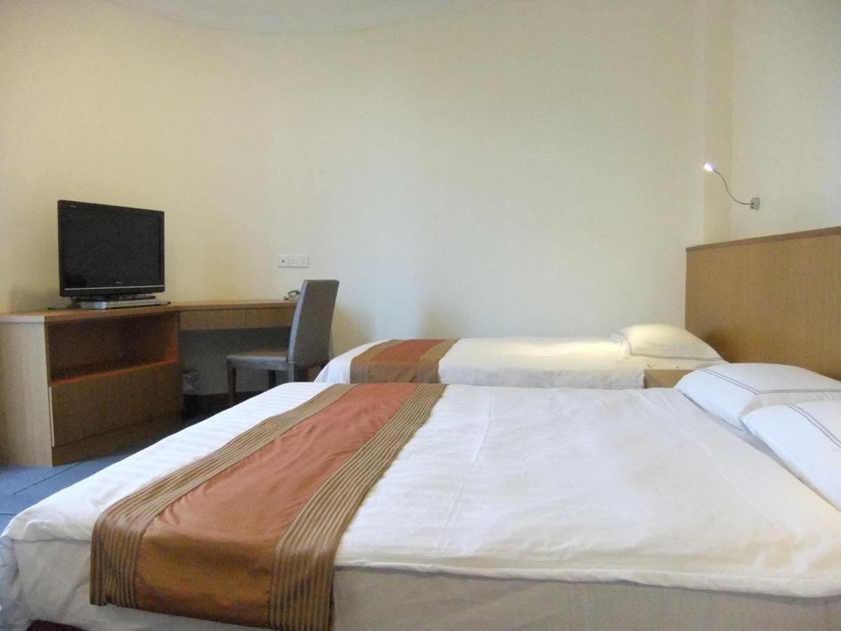 New Cape Inn  Singapur Zimmer foto